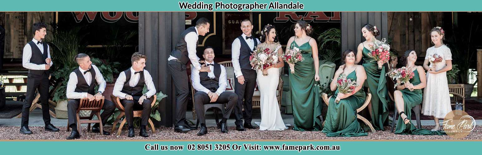 Photo of the Groom and the Bride with the groom men, bridesmaids and flower girl in stolen shot Allandale NSW 2320