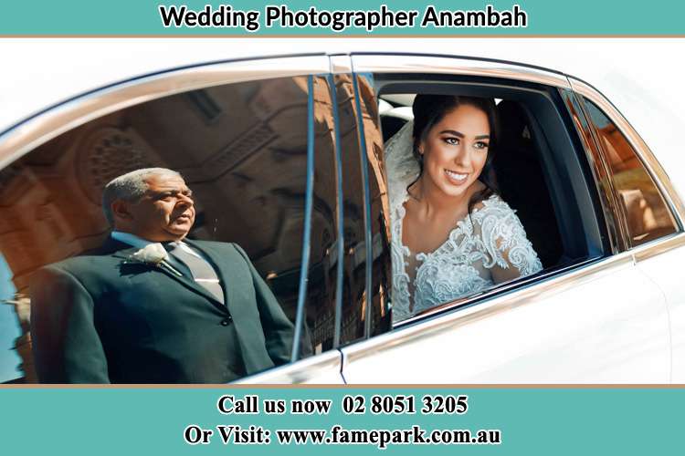 Photo of the Bride inside the car with her father standing outside Anambah NSW 2320