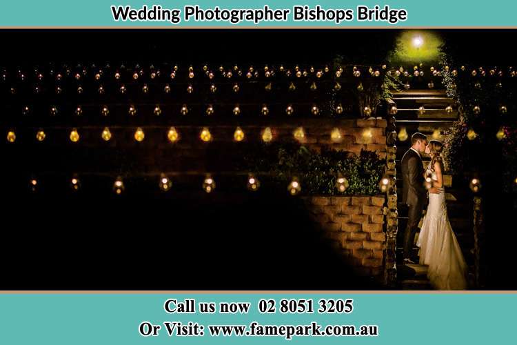 Cinematic photo of the Groom and the Bride kissing