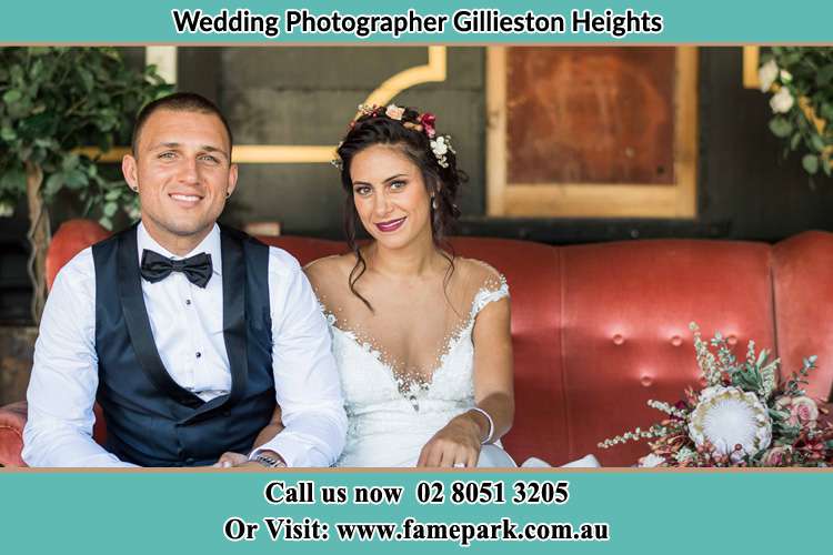 Photo of the Groom and the Bride sitting and smiling Gillieston Heights NSW 2321