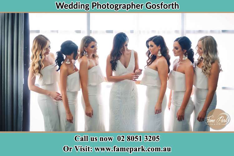 Photo of the Bride checking her ring as her bridesmaids looked on Gosforth