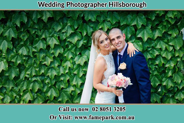 Photo of the Bride and the Groom striking a pose to the camera Hillsborough NSW 2290