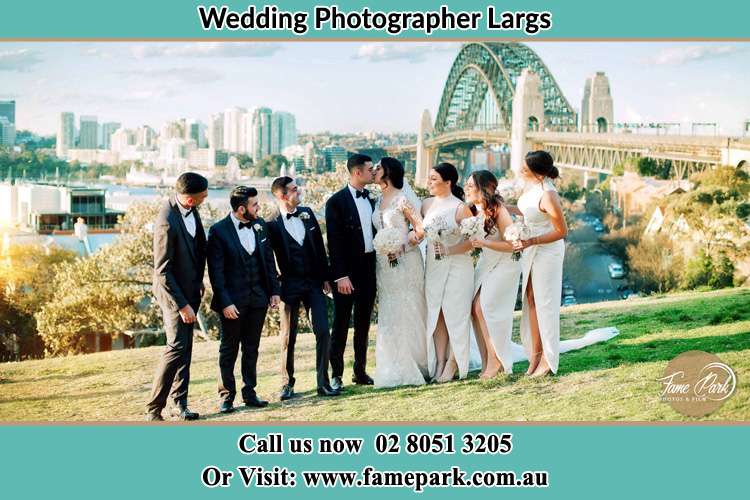 Photo of the Groom and the Bride with the entourage near the bridge Largs NSW 2320