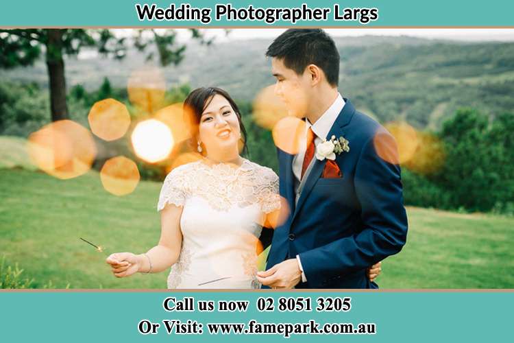 Photo of the Groom and the Bride having a nice chat at the yard Largs