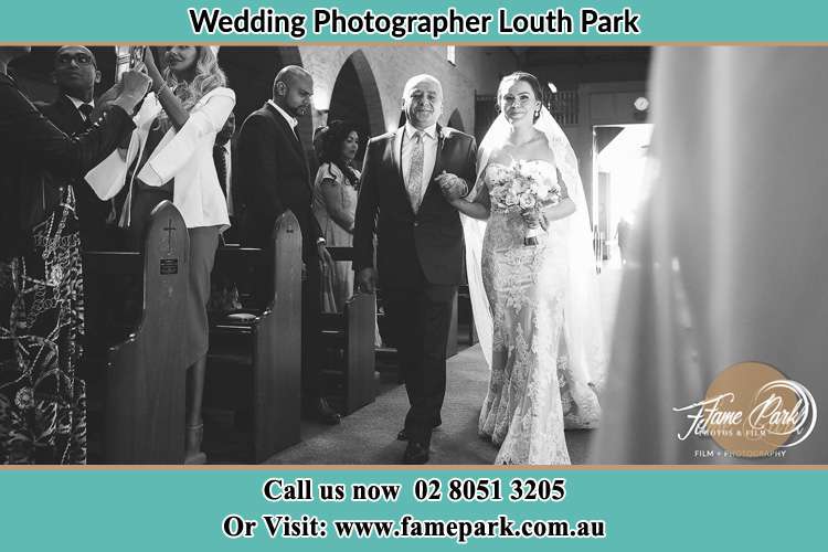 Photo of the Bride with her father walking the aisle Louth Park NSW 2320