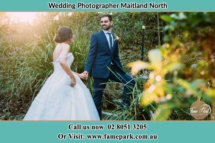 Photo of the Bride and the Groom going up the hill Maitland North NSW 2320