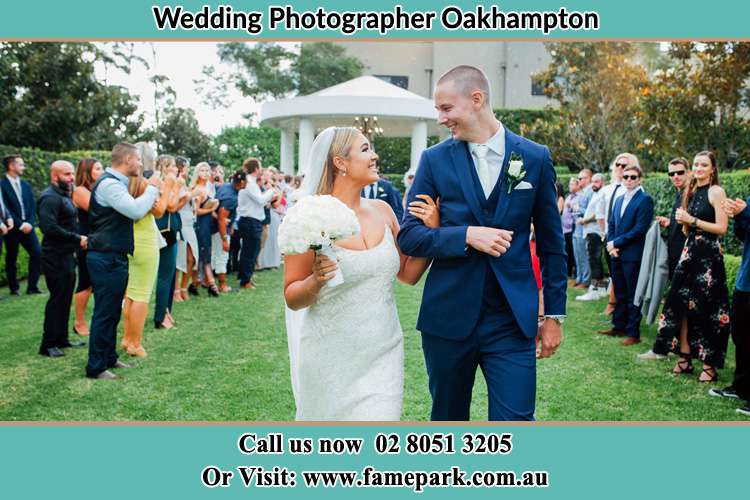 Photo of the Bride and the Groom looking at each other while walking Oakhampton NSW 2320