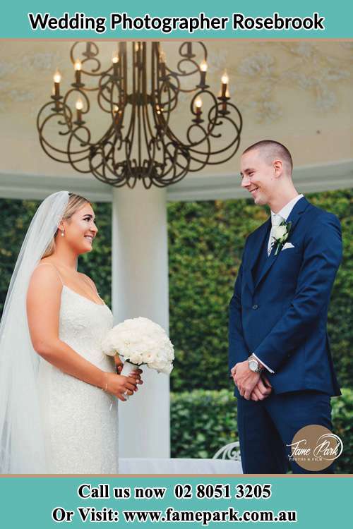 The Groom and the Bride happily looking at each other Rosebrook