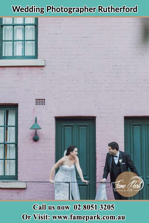 Romantic photo of the Bride and the Groom at the balcony Rutherford NSW 2320